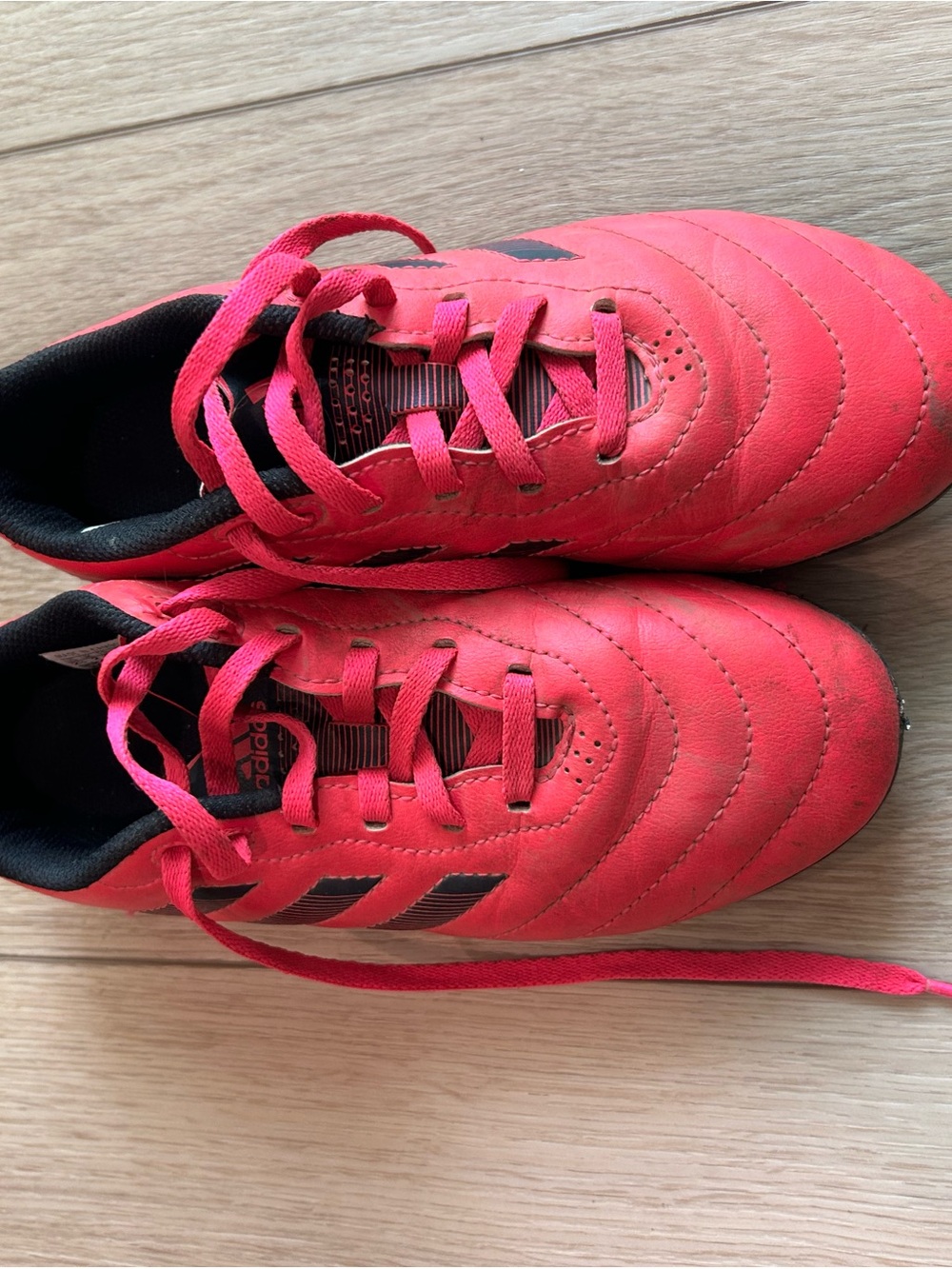 adidas Kids pink and black cleats